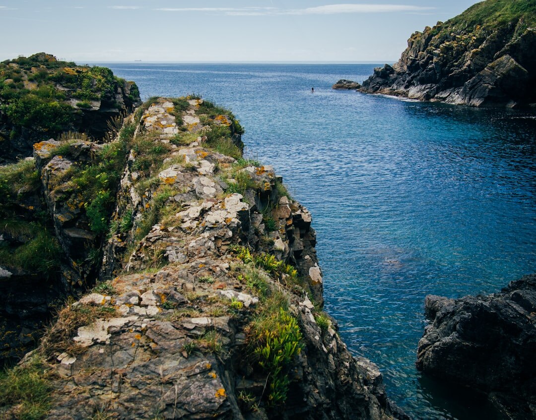 Rugged Cornwall coastline with cliffs and turquoise sea