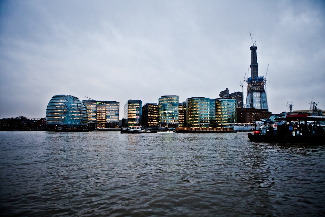 London skyline at dusk with river reflections